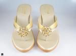 Heel type sandals for ladies in gold with center stone in floral design - 4