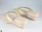 Heel type sandals for ladies in gold with center stone in floral design - 2